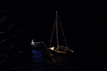 As we were preparing to sail away, local boats were putting on a Christmas light show in the harbor.<br>December 12, 2015