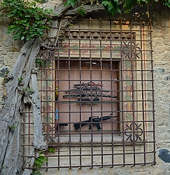 October 17, 2013<br>In the preserved Medieval town of Grazzano, which is now a tourist attraction, one shop sells ... samurai swords and fake assault weapons.