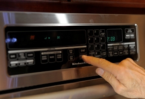 You have to clear an error code that comes up from having power cut to the microwave panel.   Just hit the cancel button.