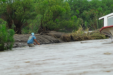 Got a croc coming - get out of the water!