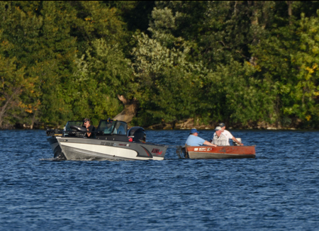 September 6, 2019<br>The Rescue.   Dale took Tom and George to another lake at which point the outboard motor died.   The boys paddled for a while and were fortunate to pick up a tow back home.