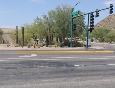 Seven weeks after the March 25 accident. An ugly scar on the pavement remains where the motorcycles were run over by a dump truck. There is still some melted aluminum on the pavement caused by the resulting fire. 