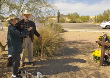 Witnesses Don and Patricia Morris point to where they saw the wreck.   They came by a few minutes after it occurred.  They gave high praise to the efforts of the Walgreen's manager (Donna), who assisted with the rescue and helped with the memorial.