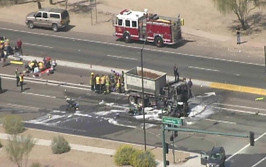 From online news reports - March 25, 2010, eight motorcycles were run over by a dump truck while they were sitting in traffic at a red light at 27th Drive and Carefree Highway. The driver never applied the brakes. At least one car in front of the motorcyclists was also destroyed by the impact.<br><br>The tree visible in the lower left was gradually covered with bandanas left by passing motorcyclists in remembrance of the victims.