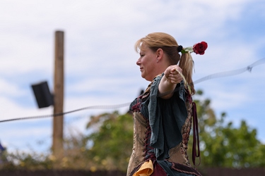 April 1, 2018<br>Using a whip to cut a rose in half.