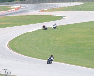 I caught part of a wreck up in turn 4.  The rider walked away and later rode the bike back to the pits.