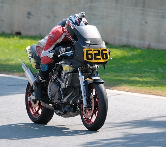 All bikes must have a belly pan that catches oil leaking from engines.  Some people use a roasting pan to save money.