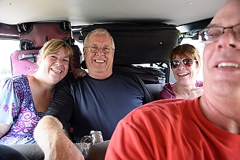 The taxi van was a tight fit with 9 people and luggage.<br>September 26, 2015