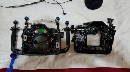 Step 5<br>Open the housing to remove the 180 degree viewfinder.  (Remove an o-ring holding the viewfinder in place, swap in the stock viewfinder, replace o-ring.)